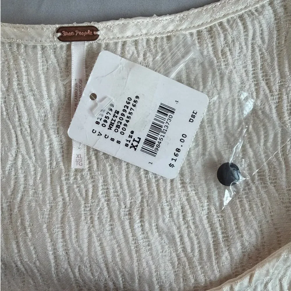 Free People NWT Cream Peplum Blouse Women's XL Textured Puff Sleeve Bow Top